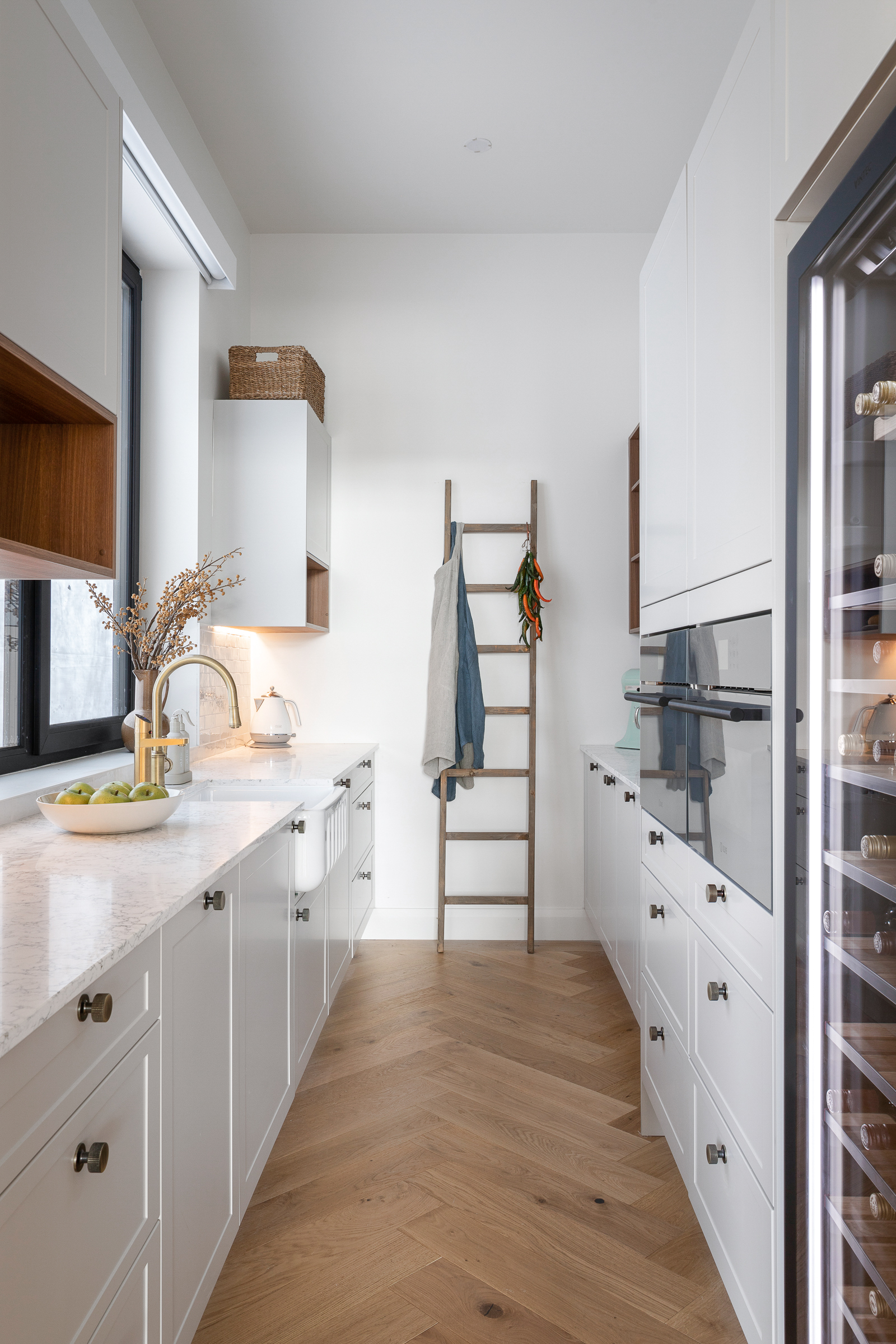 Double oven and wine fridge elevates this pantry 