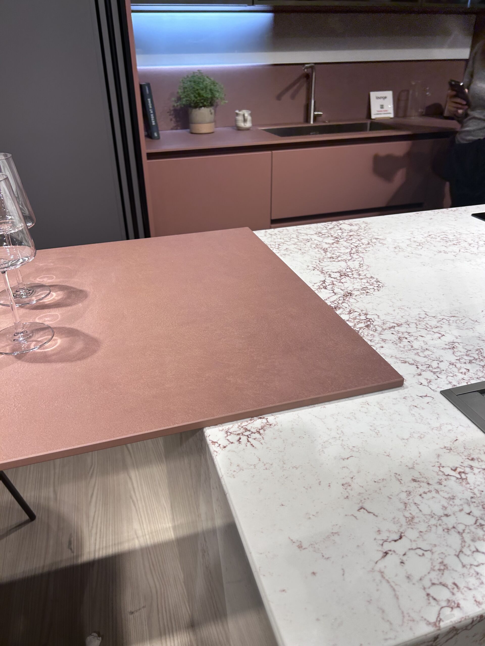 Pink/rose gold metallic style benchtop with white and pink marbled detail