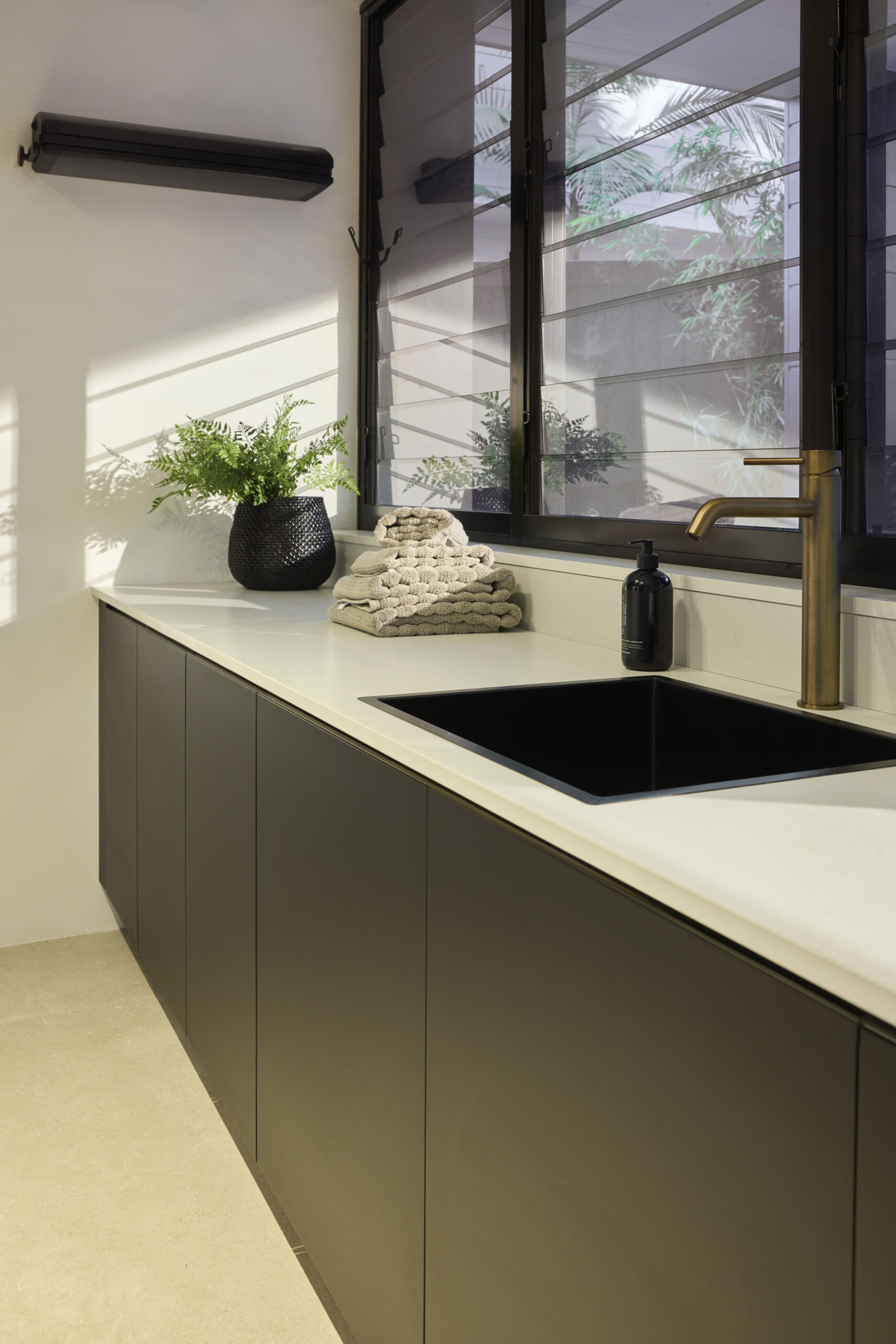 small-laundry-with-sink-and-tap