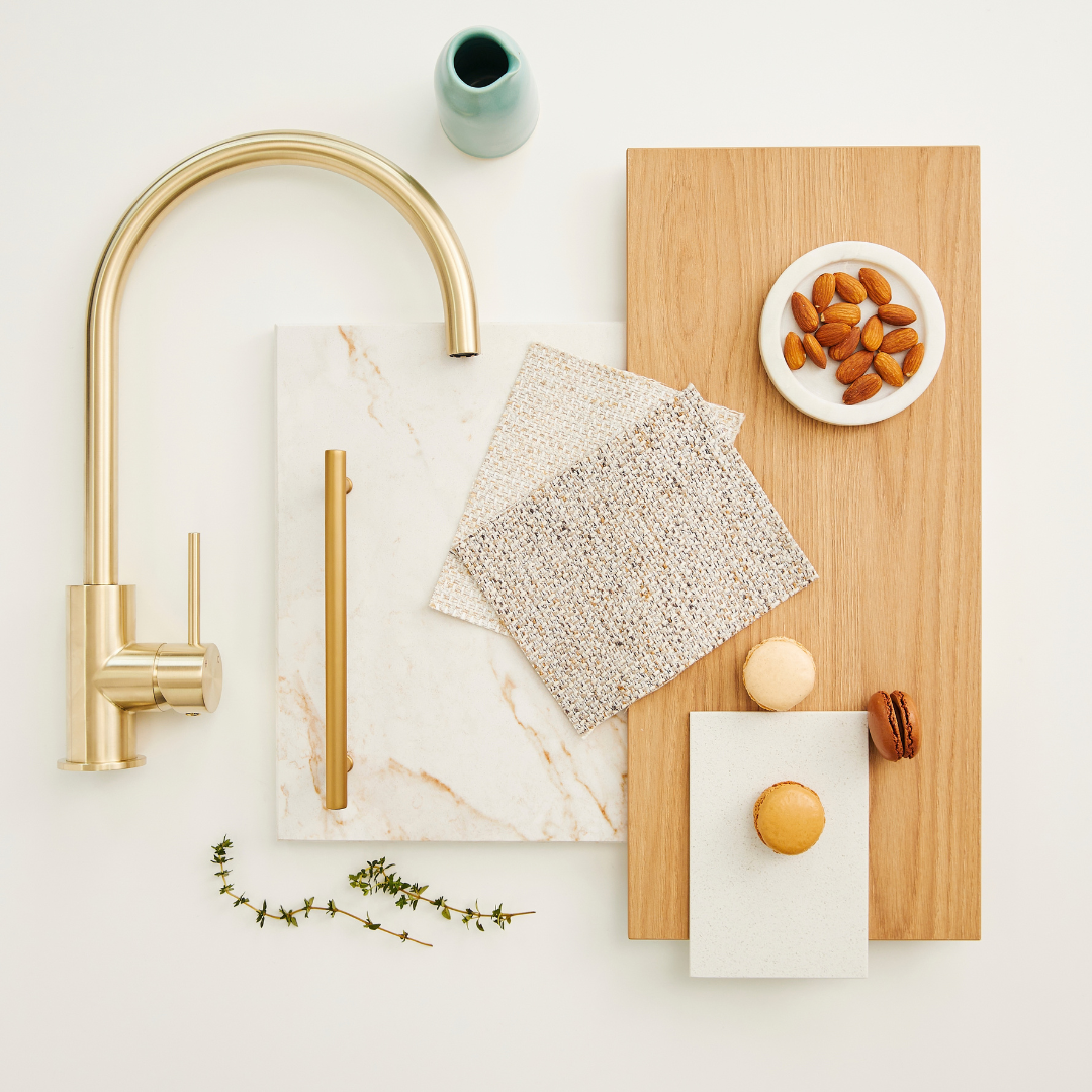 Flat lay of kitchen items such as cabinetry, benchtop and tapware samples