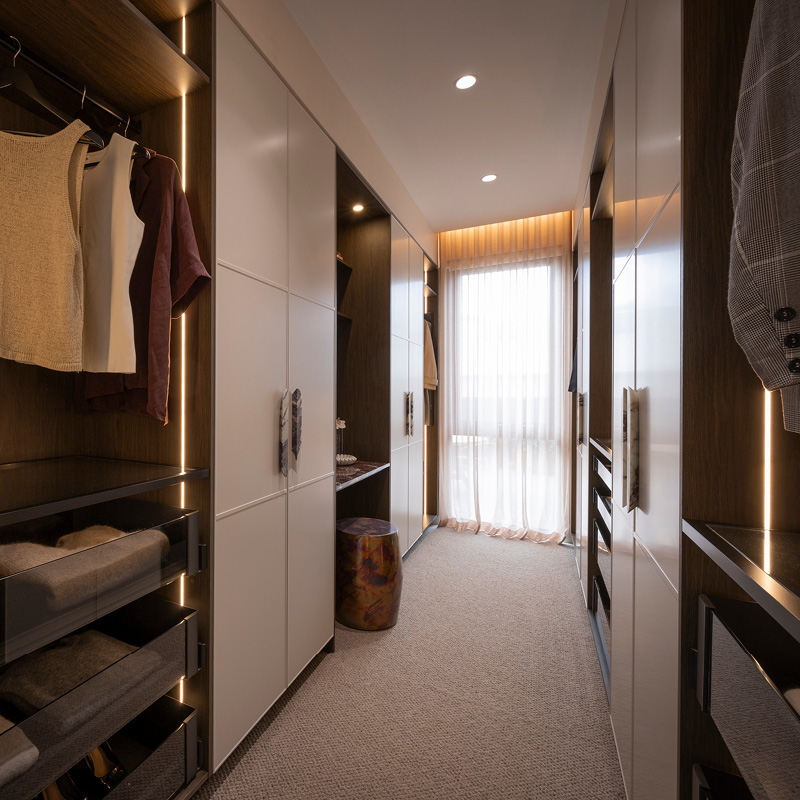 The Block 2025 – House 2 – Han & Can The Block 2025 - House 2 - Han & Can: Freedom Kitchens Block 26 reveal with walk-in wardrobe with white cabinetry, timber shelving, LED lighting.