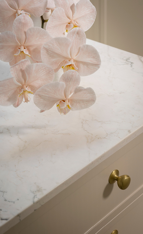 Cosentino marble-look wardrobe island benchtop with orchid styling