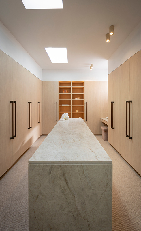 Lisa and Rosco’s winning Pale Oak walk-in wardrobe with central stone island